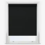 Blackout roller blind in a white window frame