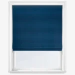 Blue Roman blind in a white window frame