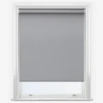 Light gray roller blind in a white window frame