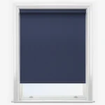 Navy blue roller blind in a white window frame