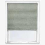 Sage green roman blind in a white window frame