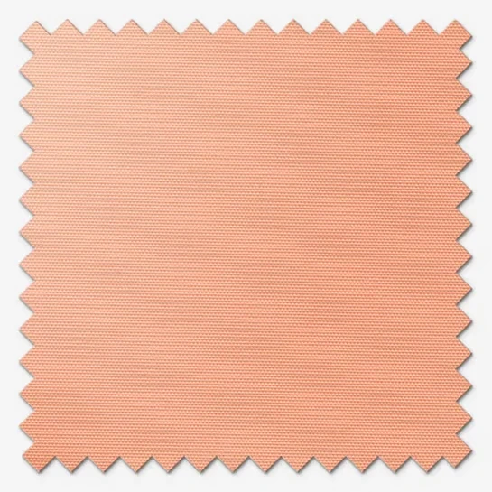 Swatch of peach textured fabric with pinked edges