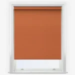 Terracotta roller blind in a white window frame