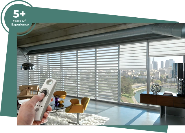 hand holding a remote to adjust white motorized sheer horizontal blinds